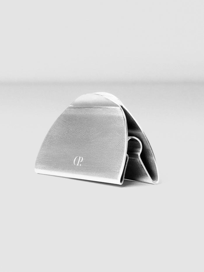 Side view of the metal clip stand to display the channels used to hold paper and accessories.