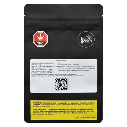 Front view of the black pouch labeled "Modified Grapes" showing the bc green logo, THC symbol, white product panel, and yellow warning box.