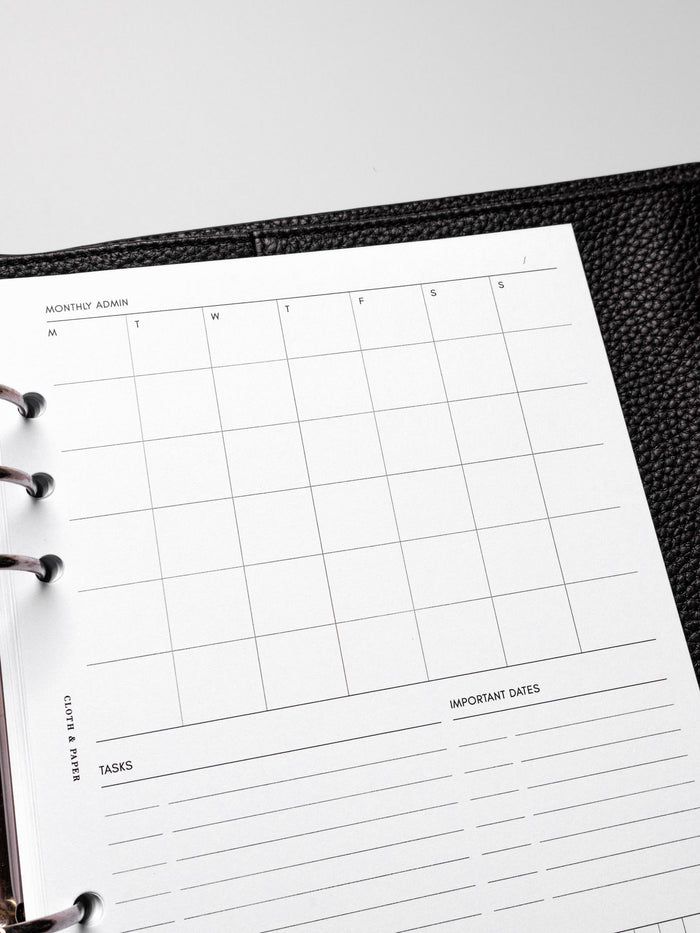 Insert in use inside a black leather planner.