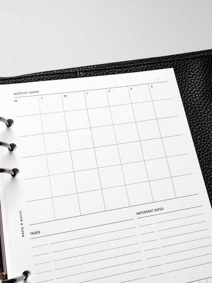 Insert in use inside a black leather planner.