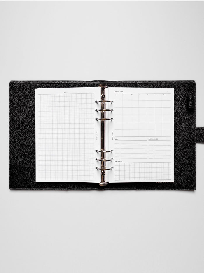 Insert in use inside a black leather planner.