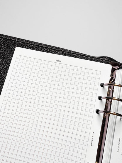 Insert in use inside a black leather planner.