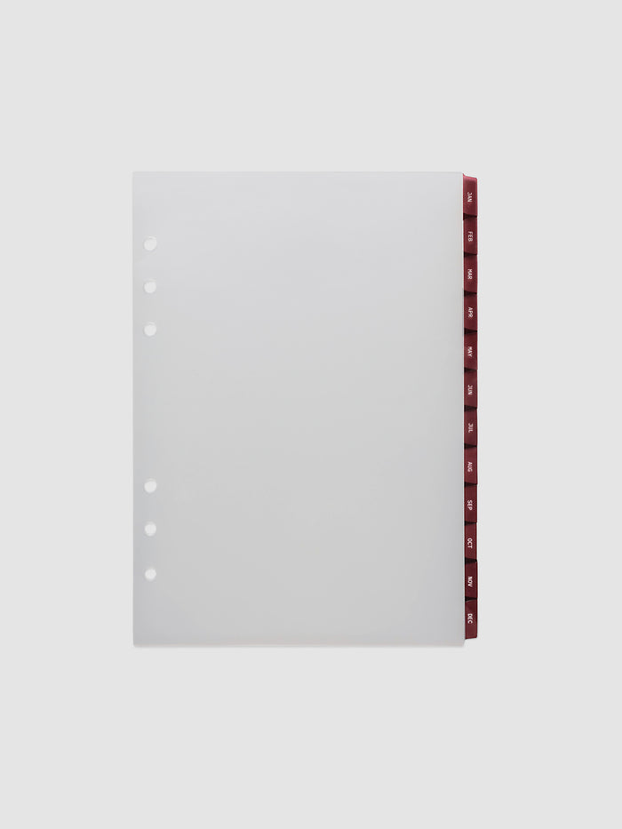 A5 6-Ring Punch Ultra-Thin Monthly Dividers in deep red, set of 12 dividers fanned to show all months