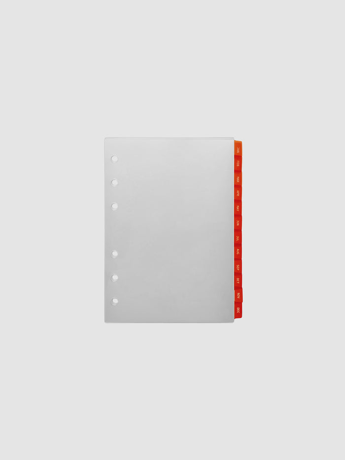A6 6-Ring Punch Ultra-Thin Monthly Dividers in deep orange, set of 12 dividers fanned to show all months