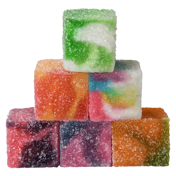 Stacked pyramid of sugar-coated colorful cubes showing green, orange, rainbow, purple, and pink faces of No.2 Red Label Multi-Cannabinoid Lights Out.