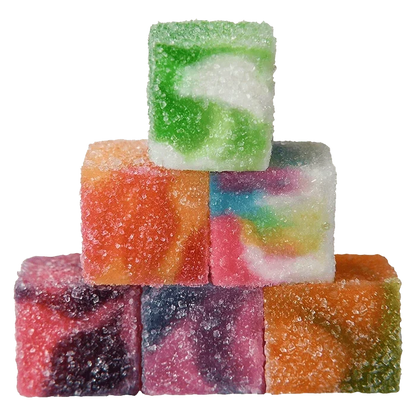 Stacked pyramid of sugar-coated colorful cubes showing green, orange, rainbow, purple, and pink faces of No.2 Red Label Multi-Cannabinoid Lights Out.