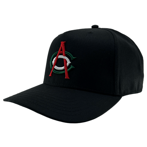 The OAC Logo 5 Panel by OAC is a black snapback cap with a structured crown and curved brim, featuring an embroidered front logo of a bold red “A” layered over a green and white “C,” representing the Oakland Athletic Club. The cap is photographed against a plain white background.