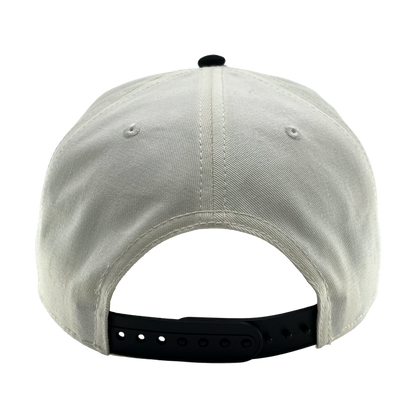 An OAC Logo 5 Panel cap in white, viewed from the back, features a black adjustable snap closure. The plain fabric includes stitched eyelets and a central seam for added detail. This snapback cap has an embroidered OAC logo, set against a clean white background.