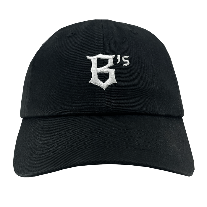 The Oakland Ballers Dad Hat, offered by the Oakland Ballers team, is a black baseball cap that prominently displays the white embroidered text "B's" on the front. Representing the new professional baseball team, this cap features a curved brim and an adjustable back strap for a casual style. The bold, slightly ornate font adds a distinctive touch to the design.