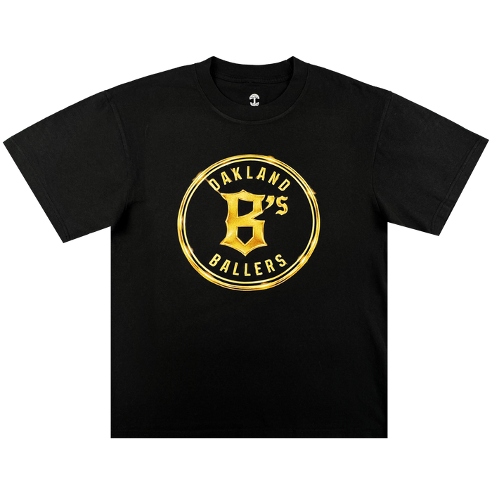 The Oakland Ballers Gold Tee features a black design with a gold circular logo and bold "Oakland B’s Ballers" text on the chest—a stylish choice for any pro baseball or Oakland Ballers fan.