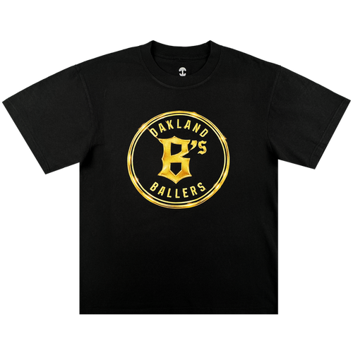 The Oakland Ballers Gold Tee features a black design with a gold circular logo and bold "Oakland B’s Ballers" text on the chest—a stylish choice for any pro baseball or Oakland Ballers fan.