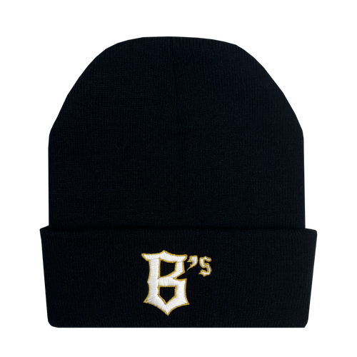 The Oakland Ballers Logo Beanie is a black beanie hat with a folded brim that features the embroidered logo of the professional baseball team, Oakland Ballers. The logo consists of a stylized white and yellow letter "B" followed by small letters "'s." The hat has an otherwise plain design except for the logo on the brim.