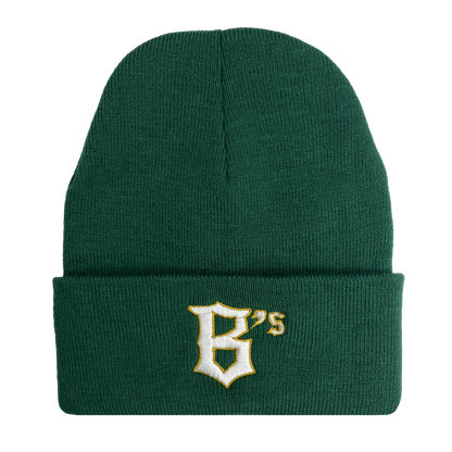 The Oakland Ballers Logo Beanie features a ribbed, green knit with a turned-up cuff. The cuff showcases an embroidered "B's" design in white and gold lettering, reminiscent of the Oakland Ballers' style. The fabric is textured for warmth and comfort, while the plain background accentuates this professional baseball team-inspired hat.