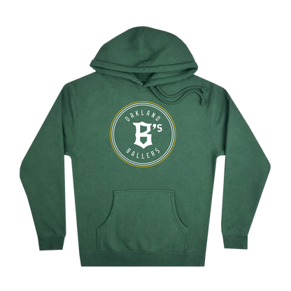 The Oakland Ballers Logo Heavyweight Hoodie by Oakland Ballers is a green sweatshirt featuring a large white "B" in a circular logo and "Oakland B’s Ballers" printed on the chest to celebrate the Oakland Ballers pro baseball team. This hoodie includes a front pocket, a drawstring hood, and is displayed against a plain white background.