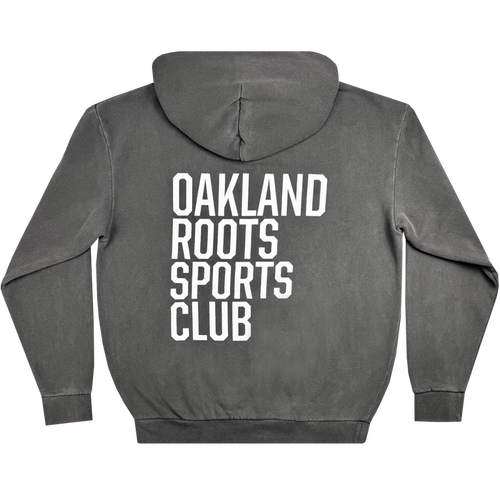The Oakland Roots SC Heavy Hoodie from Oakland Roots SC features a hood and displays large white text reading "OAKLAND ROOTS SPORTS CLUB" vertically across the back. This long-sleeved, relaxed-fit hoodie celebrates social good and community spirit.