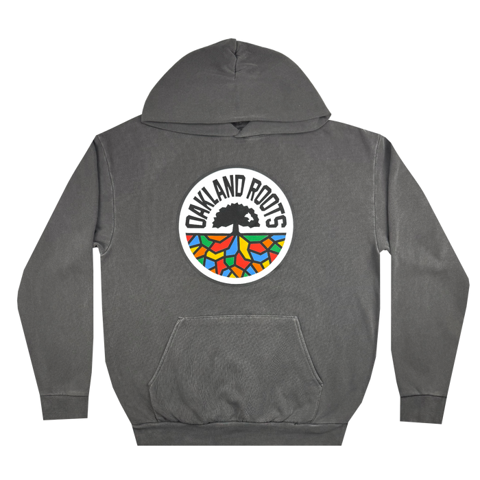 The Oakland Roots SC Heavy Hoodie by Oakland Roots SC features a front pocket and prominently showcases the "OAKLAND ROOTS" logo. The sports club's emblem includes a black tree with roots over a semi-circle in vibrant blue, orange, green, and yellow shades, with the text elegantly arching above the tree.