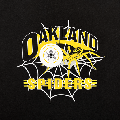The Oakland Spiders Youth Tee by Supported Brands displays a vibrant graphic design showcasing the words "Oakland Spiders" in yellow and white on a black background. The design features an elaborate spider web with a detailed yellow spider, accompanied by a circular image of a black spider at its center. Yellow and white lines highlight the Ultimate Frisbee team's dynamic logo, adding to the tee's energetic appeal.