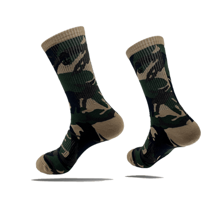 Side view of camo crew socks with a small black Oaklandish tree logo on the side calves.