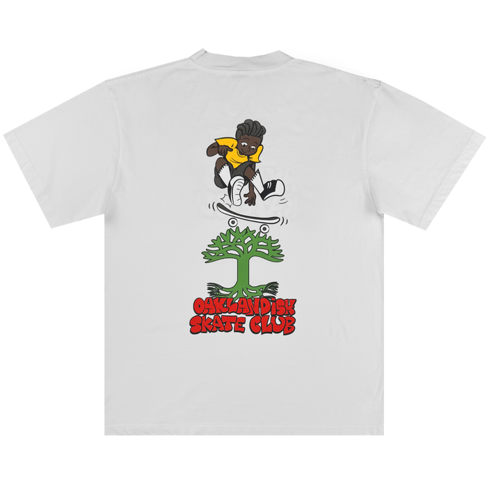 The Oaklandish Skate Club Tee by Oaklandish features a cartoon skater with dark skin, yellow shirt, and black shorts above a green frog face, with bold red "Oaklandish Skate Club" text below, celebrating skateboarding culture.