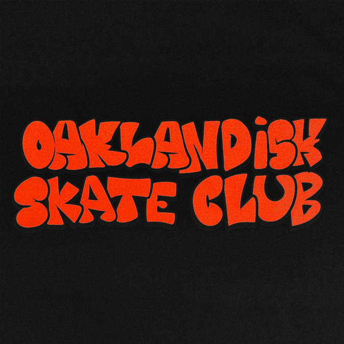 Bold, bright orange bubble letters spell "OAKLANDISH SKATE CLUB" on black. This Oaklandish Skate Club Tee captures skateboard culture with its playful retro font—perfect for a classic fit inspired by groups like Crenshaw Skate Club.