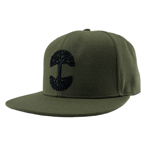 The Old English Aft Snapback is an olive green hat with a flat brim, showcasing an intricate black Oaklandish tree logo embroidered on the front center. This cap features a structured crown, adjustable snapback closure, and appears new and unworn, all set against a transparent background.
