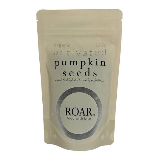 125g package of ROAR organic activated pumpkin seeds on a white background