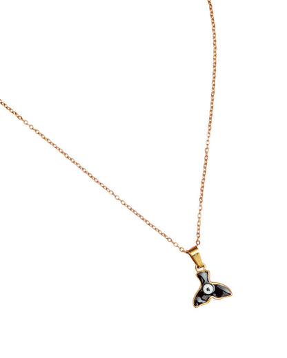 Evil eye necklace with gold chain and fin-shaped pendant, black and white enamel