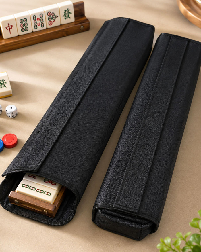 Two black mahjong tile rack case sleeves with open tops and padded sides