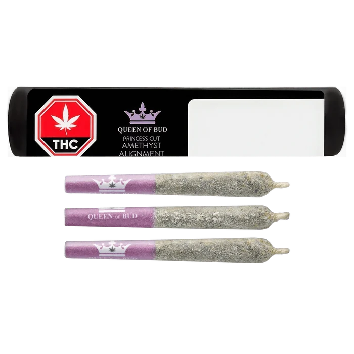 Center-aligned product shot of three cannabis joints with purple tips branded "Princess Cut Amethyst Alignment Infused PR 3 x 0.5 g" below a black package label featuring a purple crown and THC emblem.