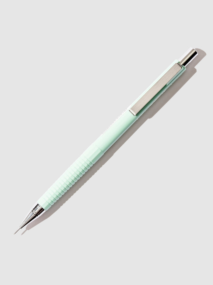 Sakura Craypas Retrico Mechanical Pencil, Cloth and Paper. Mute Green pencil displayed on a  neutral background.