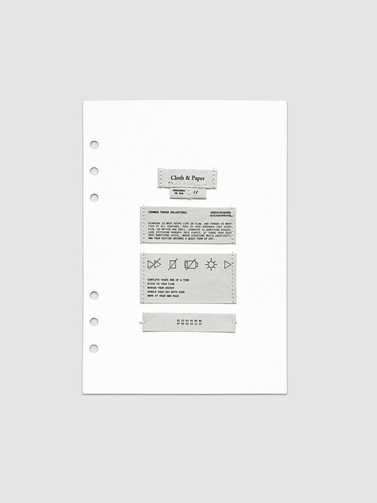 Sewn Tags Planner Dashboard shown pre-punched for 6-ring planners in size A5.