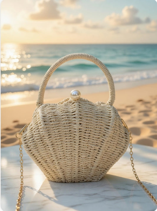 Grace Beauty shell-shaped raffia clutch handbag with woven design and pearl detail, featuring a crossbody shoulder strap.