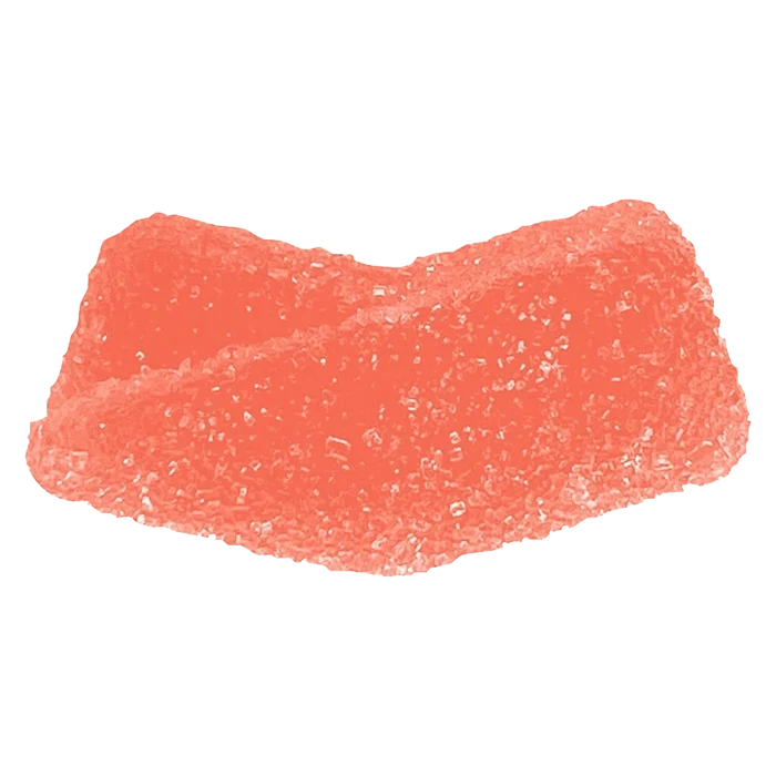 Top-down close-up of a single sugary pink Sour Strawberry Kiwi Gummies piece showing crystalline sugar texture.