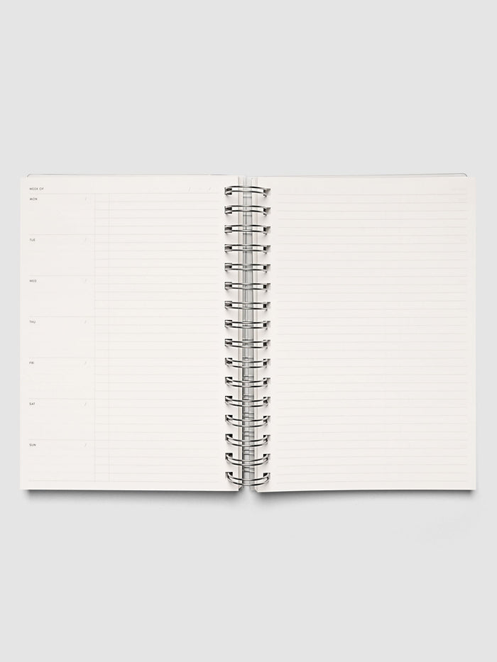 Spiral Notebook | A5 | Weekly Checklist shown open and laid flat, both pages ruled for weekly checklists with silver spiral binding at the center