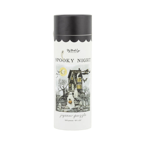 The Spooky Night | 500 Piece Jigsaw Puzzle by My Mind’s Eye comes in a cylindrical box featuring a haunted house, ghost, bare trees, full moon, and bats—ideal for spooky season fun!.