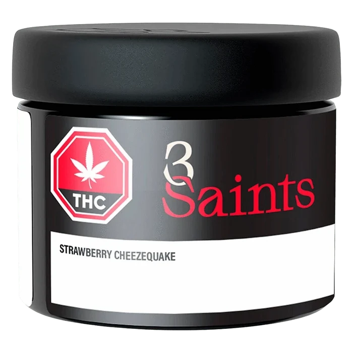 Close-up front view of the 3 Saints Strawberry Cheezequake jar against a white background, showing the black lid, THC symbol, and red logo.