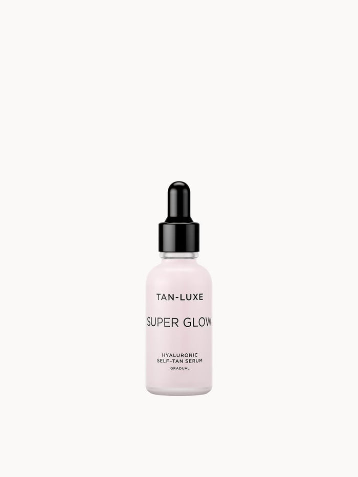 Tan-Luxe Super Glow Hyaluronic Self-Tan Serum in 30ml, a tanning oil with a smooth, glowing finish and hydrating hyaluronic acid.