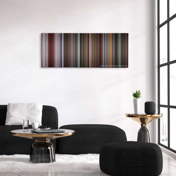 That Awkward Moment color palette canvas above a black sofa with a gold-topped table