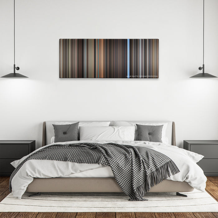 The Conversation color palette canvas above a bed, between two black pendant lamps
