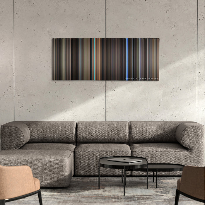 The Conversation color palette canvas on a concrete wall above a gray sectional sofa