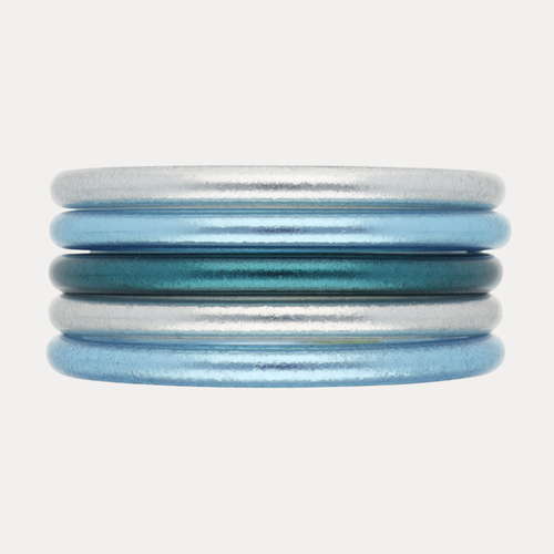 The Teal Tidal Stack featuring shimmering Silver All Weather Bangles® and vibrant Azure AWB®.