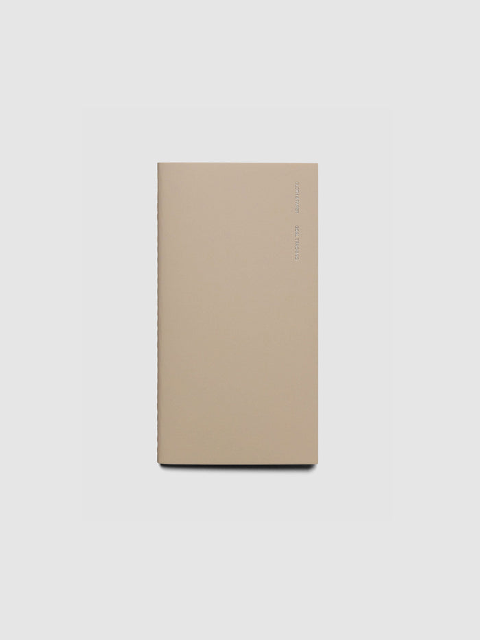 Travel Notebook in size Pocket Plus in color Ibiza with Goal Tracking pages shown closed.