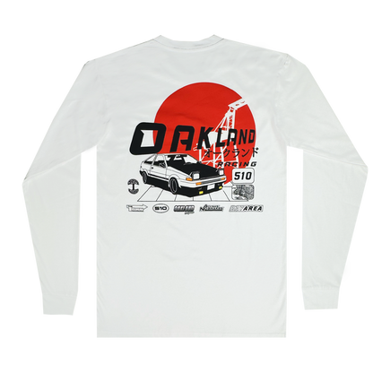 The Tuner LS Tee by Oaklandish features a classic fit with a graphic of a vintage car under a bold red sun. Highlighting "OAKLAND RACING" in Japanese characters and "510," it merges automotive and urban styles in modern art, crafted from 100% cotton for comfort.