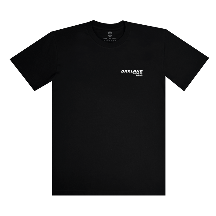 The Tuner Tee by Oaklandish is a black, classic-fit short-sleeved shirt made of 100% cotton. It features a small white "OAKLAND" logo on the upper left chest in bold uppercase letters, offering a minimalist and modern look. Available in men's sizes, it's displayed on a white background.