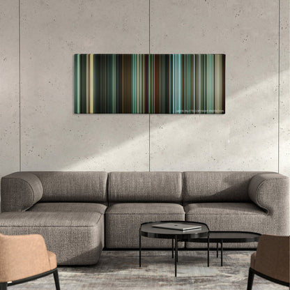 Unleashed color palette canvas on a concrete wall above a gray sectional sofa