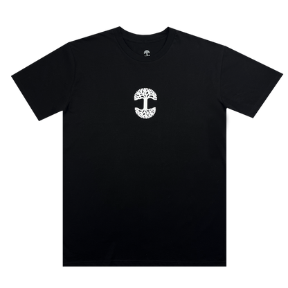 The "Who We Are and Who We Do it For Tee" by Oaklandish is a plain black, 100% cotton T-shirt featuring a small white logo on the chest. The logo resembles a stylized tree with a wide canopy and complex root system, enclosed within an oval shape. This classic fit T-shirt has short sleeves and a round neck, perfect for showcasing your Oakland pride.