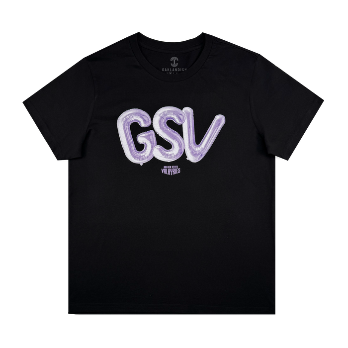 The Women's Golden State Valkyries Balloons Tee by GSV is a black classic fit women's t-shirt with large shiny purple "GSV" balloon letters and small white "WILD WARRIORS" text below, shown flat on a white background.