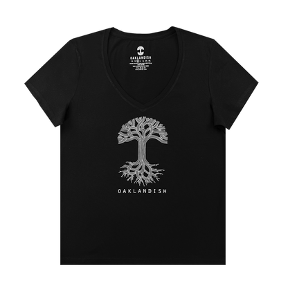 The Women's Oaklandish Logo V-Neck by Oaklandish is a black 100% cotton tee with a white stylized tree and "OAKLANDISH" in uppercase below, centered on the chest. The shirt is displayed flat on a white background.