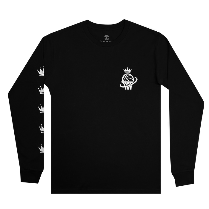 The Oaklandish WPBA Core LS Tee is a black long-sleeve shirt adorned with a small white logo on the left chest—a basketball crowned and winged, symbolizing women's sports empowerment. The left sleeve features the same emblem in smaller, vertically aligned versions.