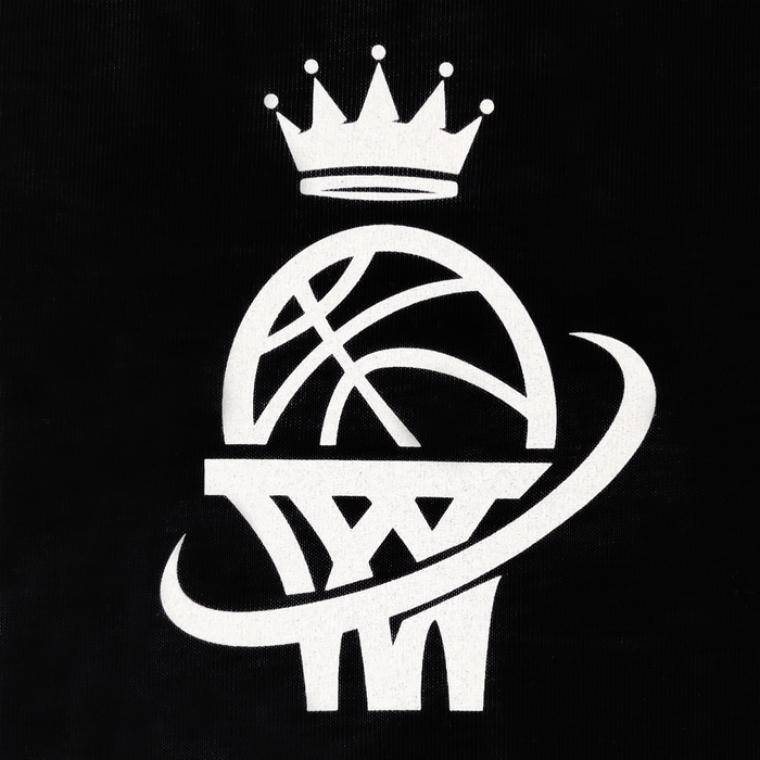 The WPBA Core LS Tee by Oaklandish showcases a stylized white basketball on a black background, featuring a basketball resting on a hoop with a swoosh wrapping around both. A simple five-pointed crown above the ball signifies grandeur or royalty, evoking empowerment in women's sports.